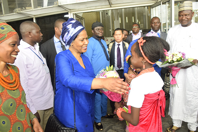 UN Women Executive Director Phumzile Mlambo-Ngcuka meets a young girl in Nigeria. Photo: UN Women