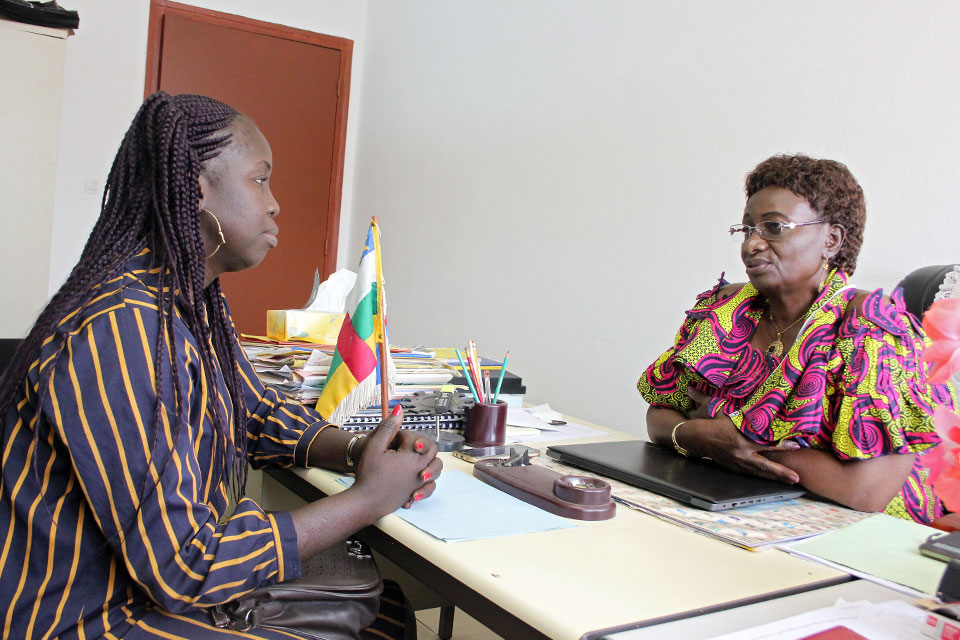 Marguerite Ramadan, Chairperson of the long standing Women Organisation OFCA, with Pamela Audrey Derom, recently elected Chairperson of the National Youth Council. Photo: UN Women/Novella Nikwigize