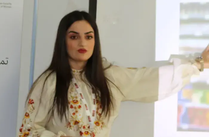 Jinda teaching women to speak Out