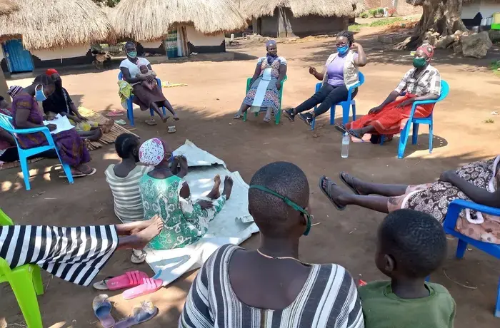 Cognitive Behavioural Therapy (CBT) group members engage in a relaxation exercise during one of their therapy sessions. Photo: Transcultural Psychosocial Organisation