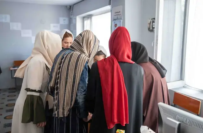 Photo of a group of women for the first story in the “After August” series. Photo: UN Women/Habib Sayed Bidell.