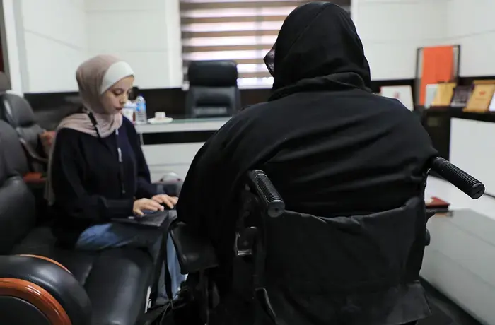 Interview of a refugee woman with disability from the Gaza Strip who received cash assistance and a cash-for-work opportunity through the CERF programme. The livelihood assistance was paired with skill development trainings and gender-based violence (GBV) protection services, including legal counselling, awareness-raising sessions, and psychosocial support. Photo: UN Women.