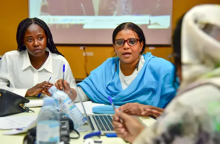 Participants interact during a conference with Sudanese women leaders in Kampala, Uganda.