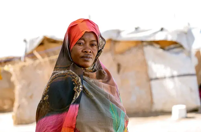 Rabha, a beneficiary of UN Women's humanitarian assistance at Saada and Salaam gathering site in Port Sudan. Through women-led organizations across the country, UN Women gives various forms of humanitarian support to the women and girls of Sudan including psychosocial, provision of dignity kits and sensitization on their rights. Photo: UN Women/Ekram Hamad Fadlalla