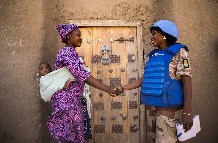 United Nations Police (UNPOL) officer from Niger on patrol in Timbuktu, Mali, working to secure the city against threats of terrorism and banditry. Photo: UN Photo/Harandane Dicko.