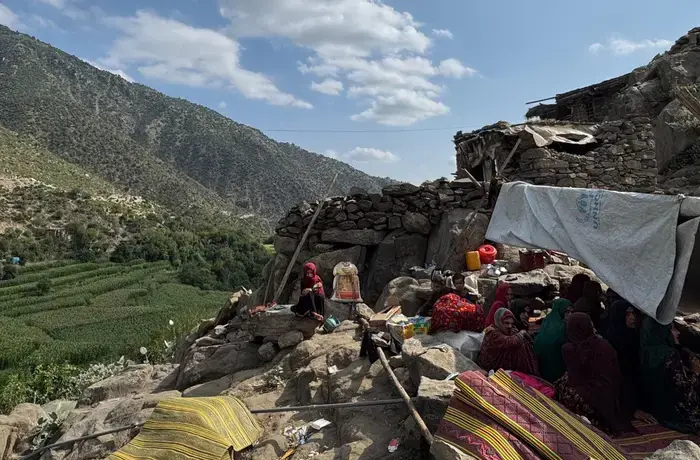Women and children in a makeshift shelter after the earthquake in Nurgal – one of the worst-affected districts in Kunar province, northeastern Afghanistan. Photo: UN Women