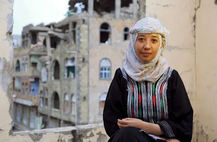 Olla Alsakkaf poses for a portrait in Yemen