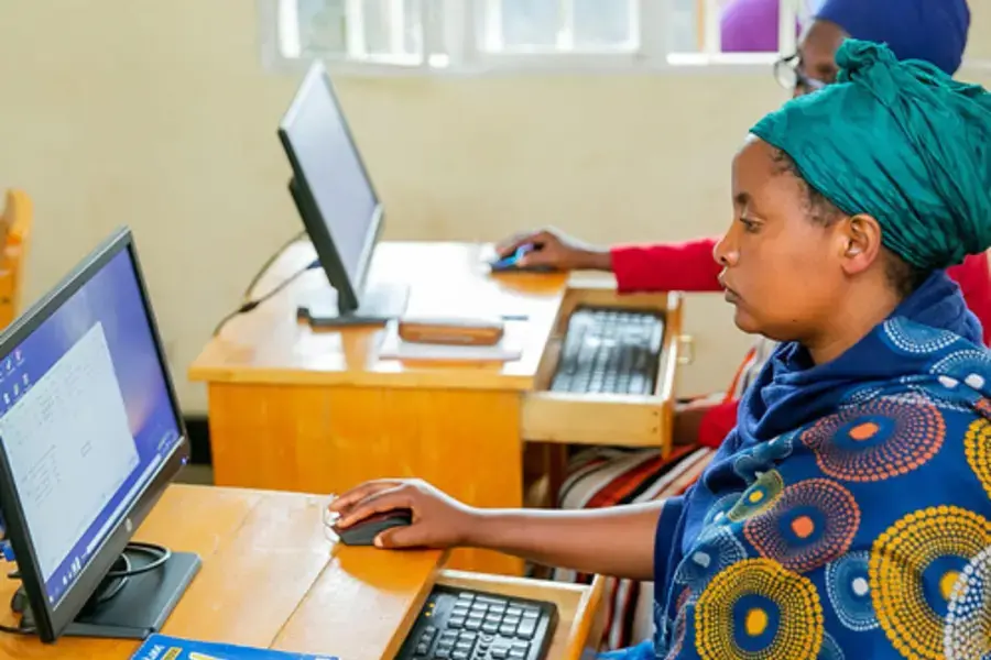 Women business owners take part in training at the ICT Chamber, an implementing partner of the Ihuzo platform, which provides digital skills to iWorkers in Rwanda, enabling them to expand their e-commerce activities. Photo courtesy of Rwanda ICT Chamber.