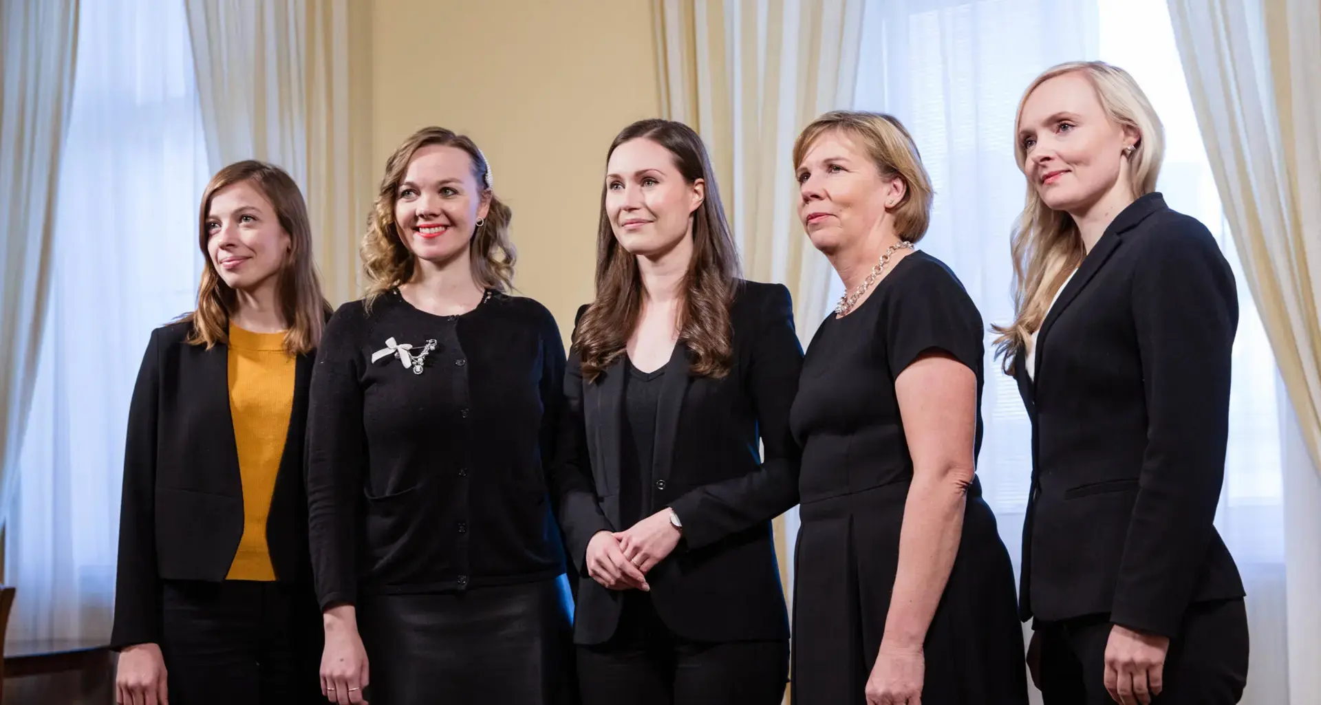 Five women leaders of the Finnish government pose for a group photo
