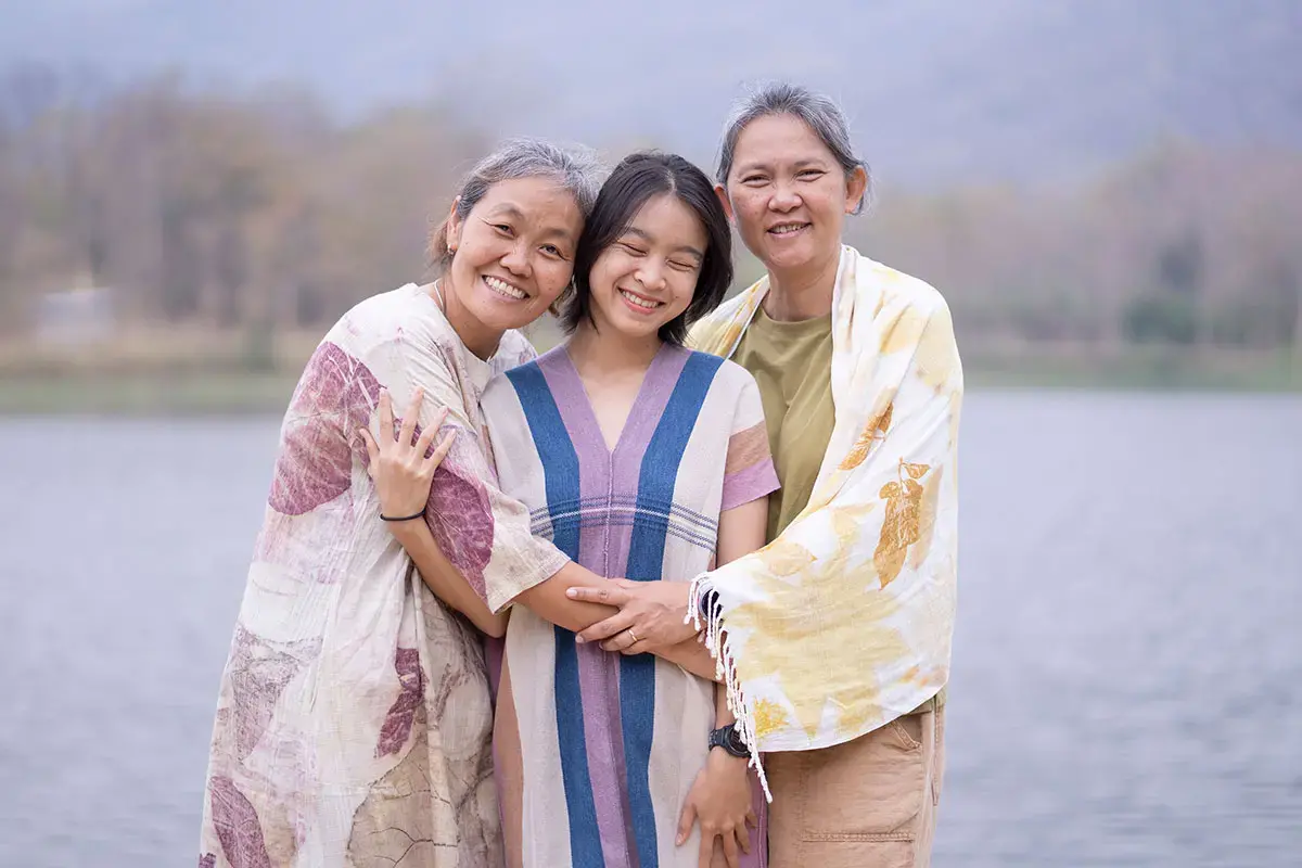 A picture of Matcha with her daughter and partner
