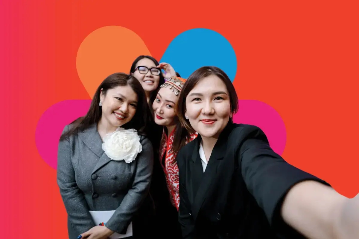 Women pose together for a selfie